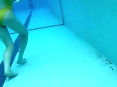 Japanese girl swim in pool with yellow swimsuit soft