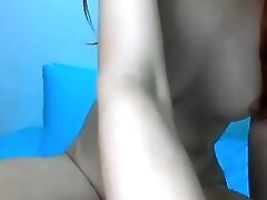 Asian webcam whore rubs her moist pussy