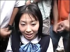 Japanese beauty gets a bukkake in public