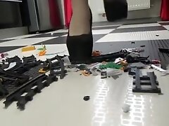 Toy Trains are crushed, pissed upon, and then burned