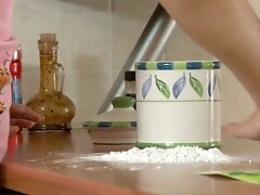 Dark Brown hottie all in flour heated with sex-toy and screwed in the kitchen