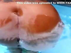 Tami enjoys the pool