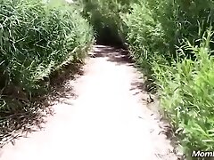 Violet is a big titted brunette who likes to get completely naked in the nature